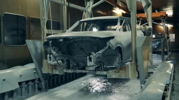 Proses pelapisan tubuh kendaraan di fasilitas manufaktur mobil — Stok Video