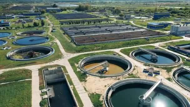 Large sewage treatment facility in daylight shot from above — Stock Video
