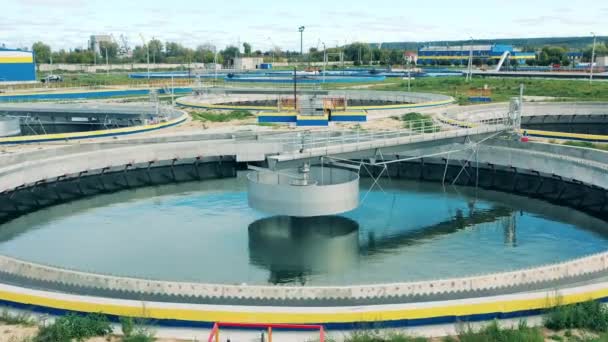 Big circular clarifiers at a wastewater treatment station. Drone shot — Stock Video