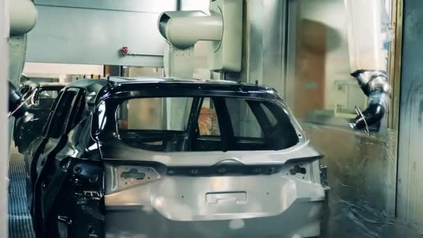 車体を塗装する自動車画家ロボット — ストック動画