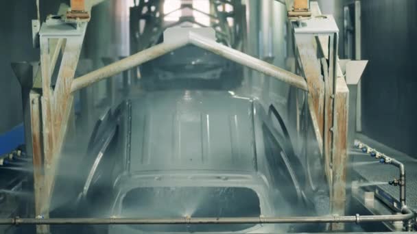 Automobile carcass is getting lifted out of liquid zinc — Stock Video