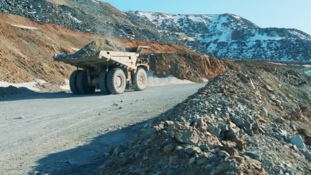 A truck is driving through the ore minery — Stockvideo