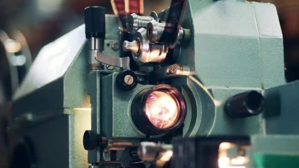 Close up of an antique film projector at work — Stock Video