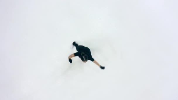 Top view of a skating rink with a female figure skater — Stock Video