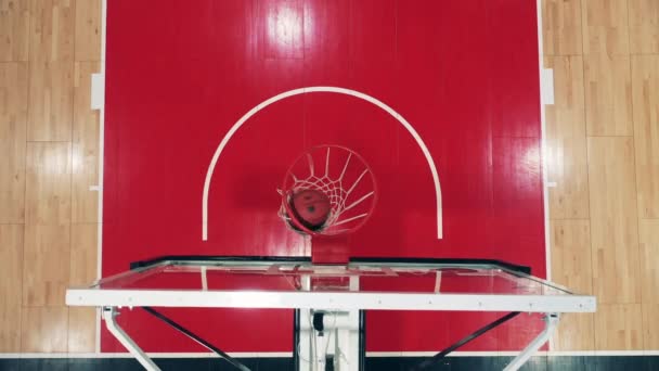 Basketball scoring filmed from above the basket — Stock Video