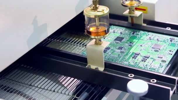 Surface Mount Technology Machine places elements on circuit boards — Stock Video