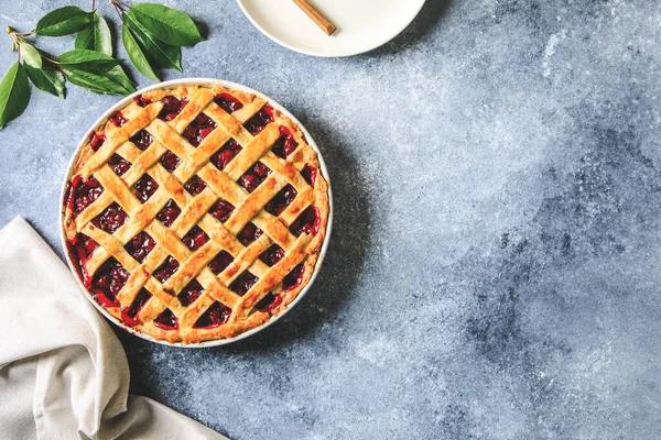 Tasty homemade American cherry pie. Delicious Homemade Cherry Pie with a Flaky Crust