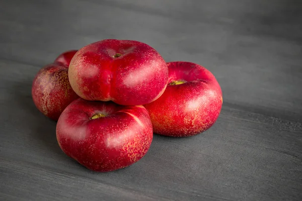 Ripe nectarines  isolated on a dark background — Stock Photo, Image