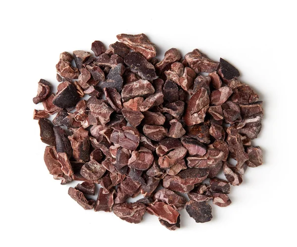 Heap of cacao nibs on white background — Stock Photo, Image