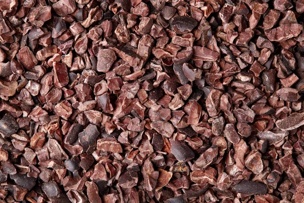 Cacao nibs background — Stock Photo, Image