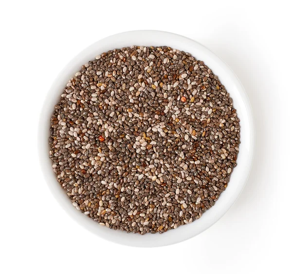 Tigela de sementes de chia isoladas em branco, de cima — Fotografia de Stock