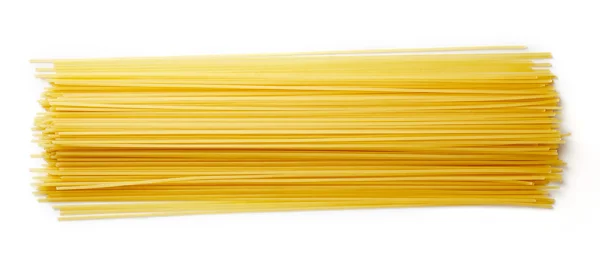 Pasta de espaguetis aislada sobre blanco, desde arriba — Foto de Stock
