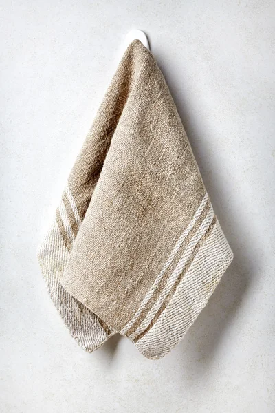 Clean and soft towel hanging at bathroom wall — Stock Photo, Image