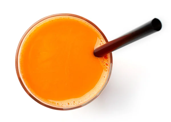 Glass of fresh carrot juice isolated on white, from above — Stock Photo, Image