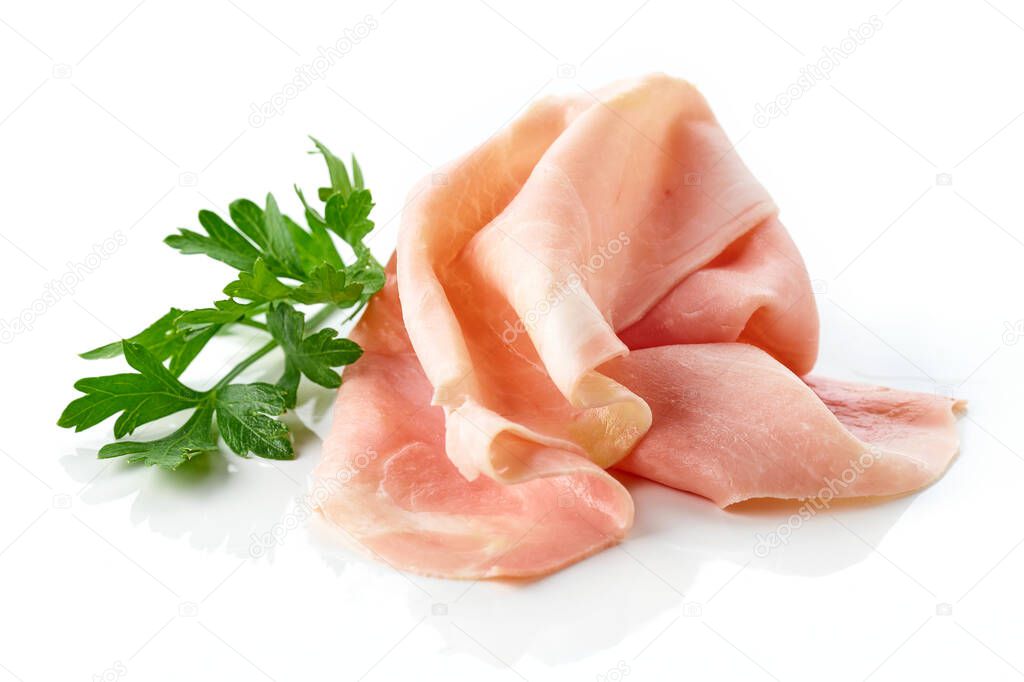 Prosciutto slices and parsley leaf isolated on white background