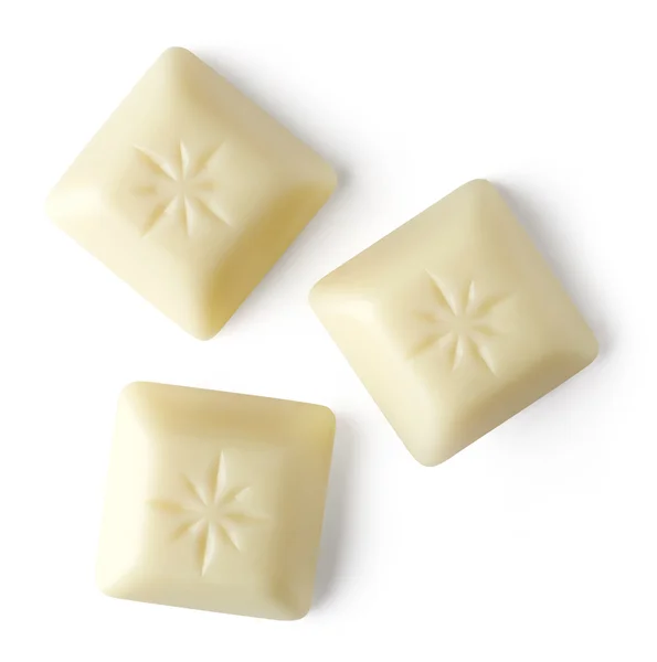 White chocolate pieces on white background — Stock Photo, Image