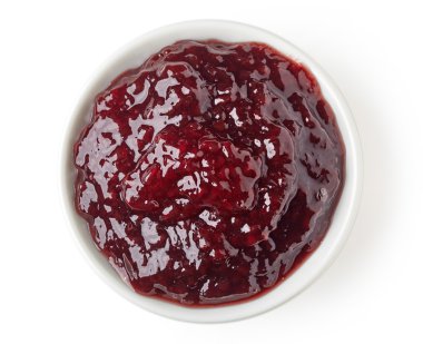 Turuncu reçel marmelat yuvarlak tabak beyaz arka plan üzerinde izole