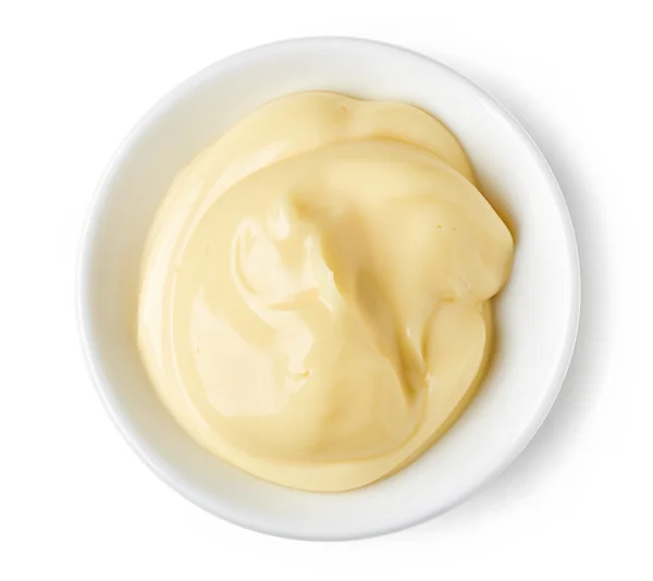 Mayonnaise en plat rond sur fond blanc — Photo