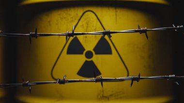 Dikenli tellerin arkasında radyoaktif tehlike işareti var. 3d oluşturma