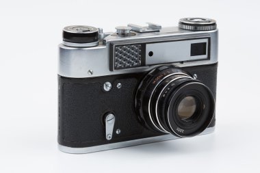 Retro film kamera beyaz bir arka plan üzerinde.