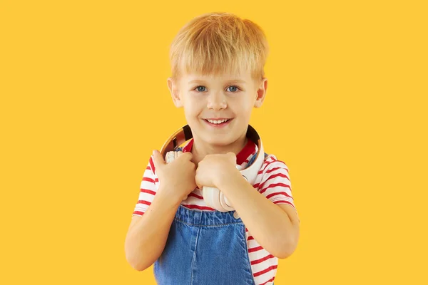 Smiling Child Boy Enjoys Listens Music Headphones Colorful Yellow Background — Stock Photo, Image