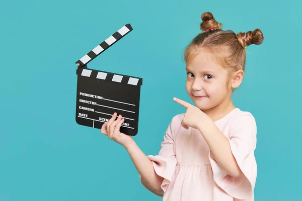Funny Smiling Child Girl Hold Film Making Clapperboard Isolated Blue — Zdjęcie stockowe
