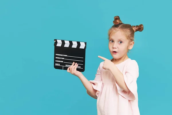 Funny Smiling Child Girl Hold Film Making Clapperboard Isolated Blue — Photo