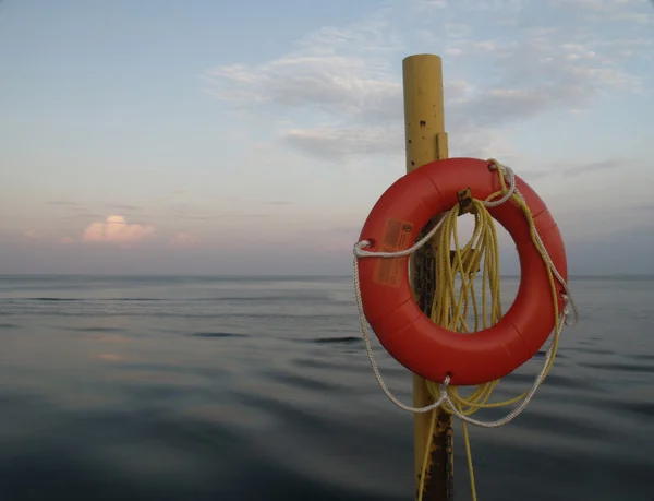 Orange Life Preserver and Lake — Stock Photo, Image