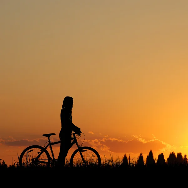 Mountain biker girl silhouette — Stock Photo, Image