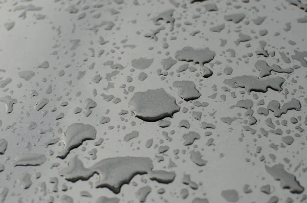 Gocce di pioggia su sfondo di vetro — Foto Stock
