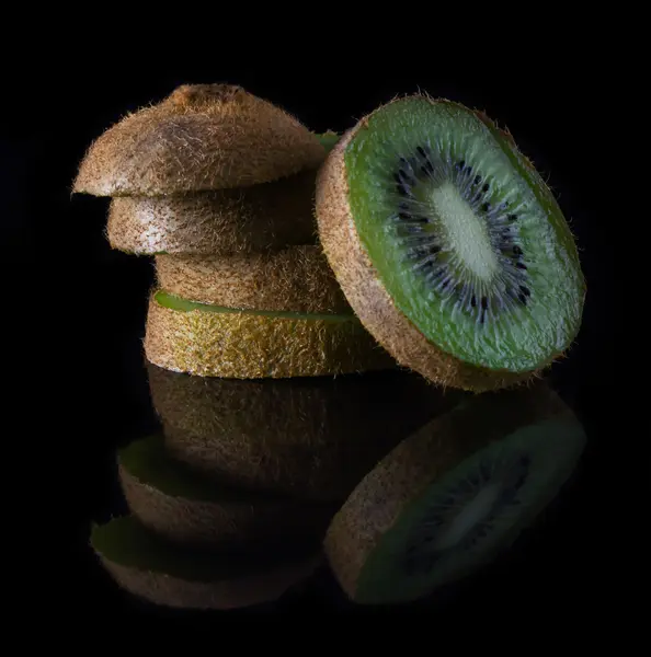 Kiwi on a black background — Stock Photo, Image