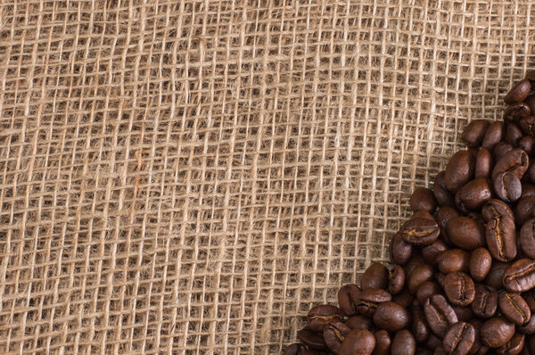 coffee beans on fabric background
