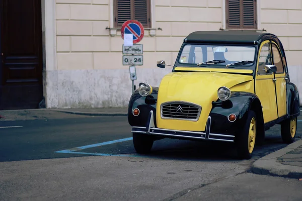 Rome January 31, 2016: A yellow black vintage car Citroen 2CV — Stock Photo, Image