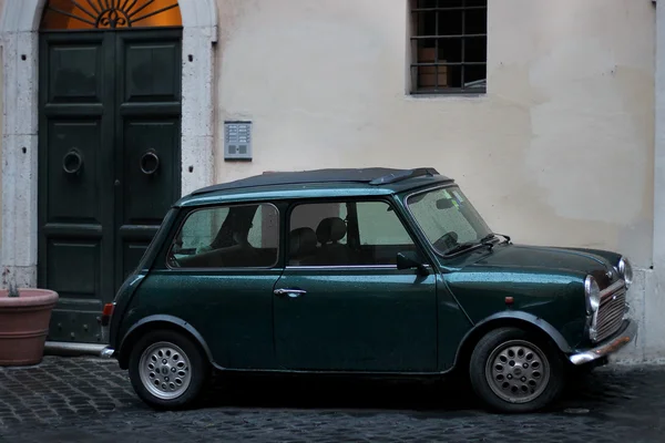 Rome January 31, 2016: A dark emerald vintage Mini Cooper — Stock Photo, Image