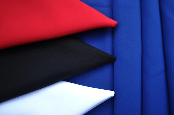 Drie servetten op blauw — Stockfoto
