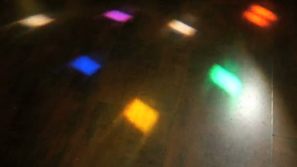 Disco light flashing different colors on the floor — Stock Video