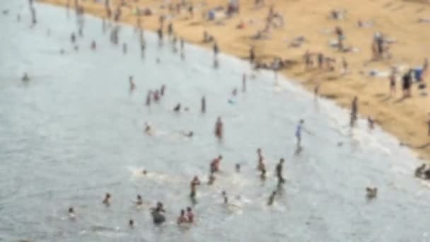 Unidentified people swimming in the sea — Stock Video