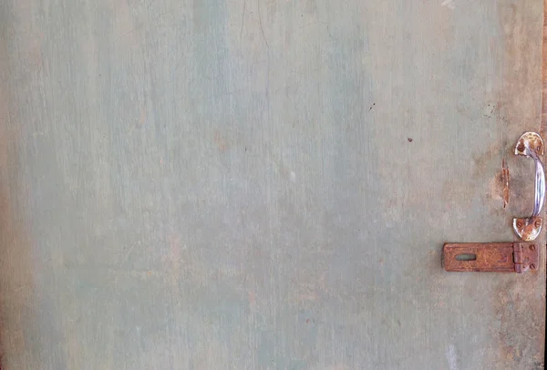 Red padlock on the old door — Stock Photo, Image