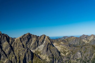 Rysy, Svinica, Maly Kozi Wierch, Cervene vrchy ve Vychodna Vysoka 'nın Slovakya' daki Vysoke Tatry dağlarındaki az sayıdaki zirvesine bakın.
