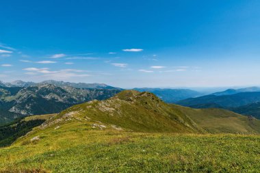 View from Varful Oslea - highest hill of Valcan mountains in Romania during beautiful summer day