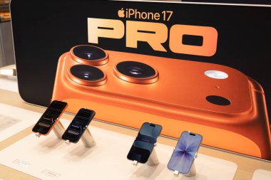 Vibrant display of the new iPhone 17 Pro in a retail store.
