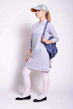 Genç kız öğrenci. İzole stüdyo portre