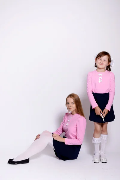 Jeunes écolières. Portrait isolé en studio — Photo