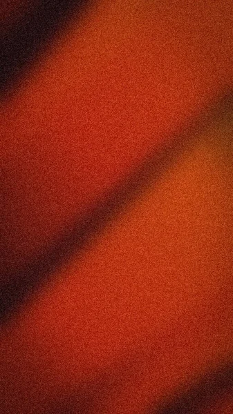 Parlak turuncu, kırmızı ve koyu kırmızı renklere sahip soyut kumlu arka plan, yumuşak gölge oyunları ve yaratıcı işler için bulanık bir doku içeriyor.