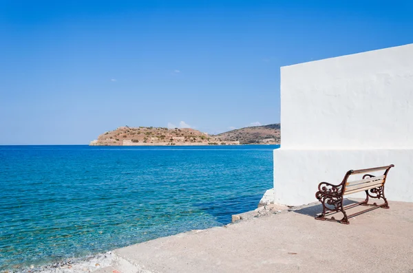 Spinalonga view from a bench in Plaka, Crete. — Stock Photo, Image