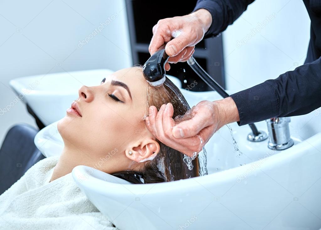 Shampoo for hair, beauty salon, hair wash Stock Photo by © 97994996