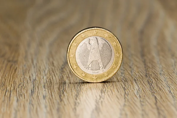 Close up of a one euro coin from the European Union member German showing a picture of the eagle