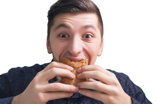 Man äter en smörgås med våldsamma isolering — Stockfoto