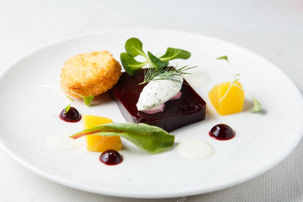 Beetroot terrine, goat cheese croquettes, horseradish sauce and dill