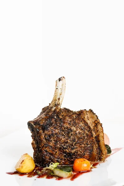 Rack of pork grilled with garnish — Stock Photo, Image